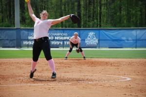 Kaitlyn Medlam delivers a pitch versus UNCW on April 13 as Whitney Phillips gets set at second base.  Rhett Lewis | THE SIGNAL