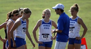 Head Coach Chris England with team. Photo Credit - Georgia State Sports Communications