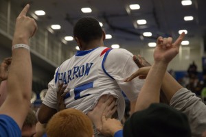 Photo Courtesy: Chris Shattuck Students lift Ryan Harrow up as the Panthers win 12-consecutive game. 