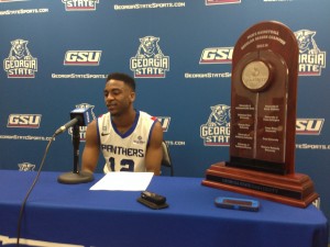 Photo Courtesy: Alec McQuade Devonta White discusses the emotions of Senior Day next to the Sun Belt trophy.