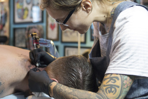 ￼Danielle Distefano, co-owner of Only You Tattoo, learned to hone her craft by watching others.  PHOTO BY RUTH PANNILL| THE SIGNAL
