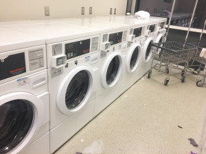 A row of unplugged washers in the University Commons. Photo by: Lauren Booker 