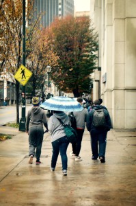 Students walk through campus on a rainy day. Photo by Justin Clay | The Signal 