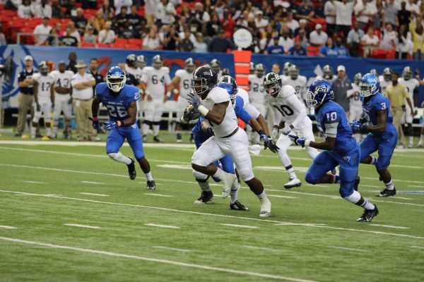 Georgia Southern running back L.A. Rambsy finds open field against Georgia State. Photo By|Brandon Warnock