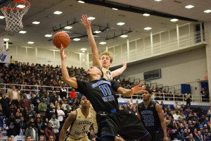 Georgia State guard, Isaiah Williams, makes a miraculous lay up in the first half. Setting the tone for an amazing rivalry game against Southern. Photo by Dayne Francis | The Signal 