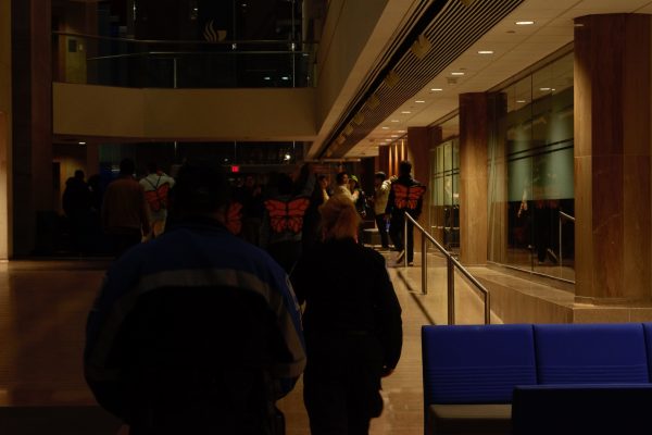 University police watch over the protesters inside the locked Honors College. Photo by Sean Keenan | The Signal