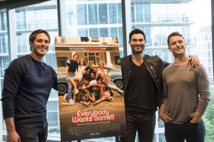 (l to r) Actors Blake Jenner, Tyler Hoechlin, and Will Brittain pose in front of the movie poster for "Everybody Wants Some!" Photos by Jade Johnson | The Signal 