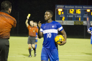 Rashid Alarape speaking to a referee during a Georgia State men's soccer game. Signal Archives 