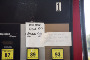 Because of gas shortages many gas stations have put up signs like the ones shown here indicting that they have ran out of a certain types of gas. Photo by Jade Johnson | The Signal 