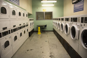 There are 12 washers and 12 dryers in the Georgia State Student Lofts , however students are uneasy with the small amount of machines that are available versus the amount of residents that live there. Photo by Jade Johnson | The Signal 