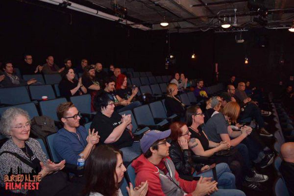 Audience members give an applause to the end of a film being screened at the Buried Alive Film Fest. Photo Courtesy of Buried Alive Film Fest Team