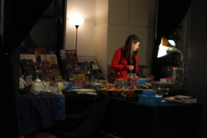 A woman looks at the books on display at the 25th Edition of the Book Festival of the MJCCA, which is being held at the MJCCA until Nov. 20. Photo by Lahar Samantarai | The Signal 