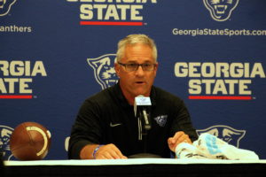 Interim Coach Lappano speaks to the media in a postgame conference.  Photo By Woody Bass | The Signal