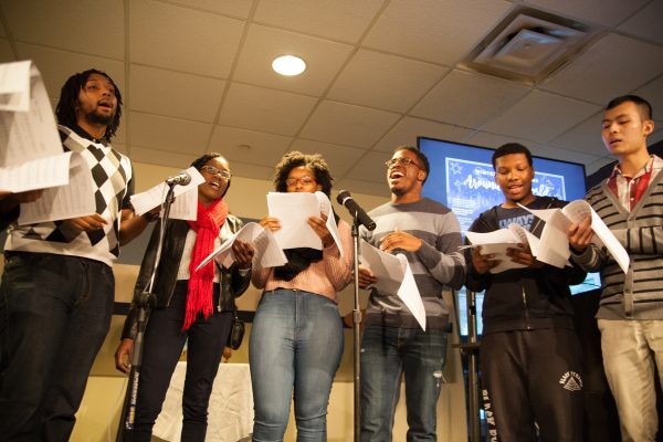 Georgia State students sing an acapella version of “This Christmas” at the Winter Celebrations Around the World located in Student Center East.   Photo by Hannah Greco | The Signal 